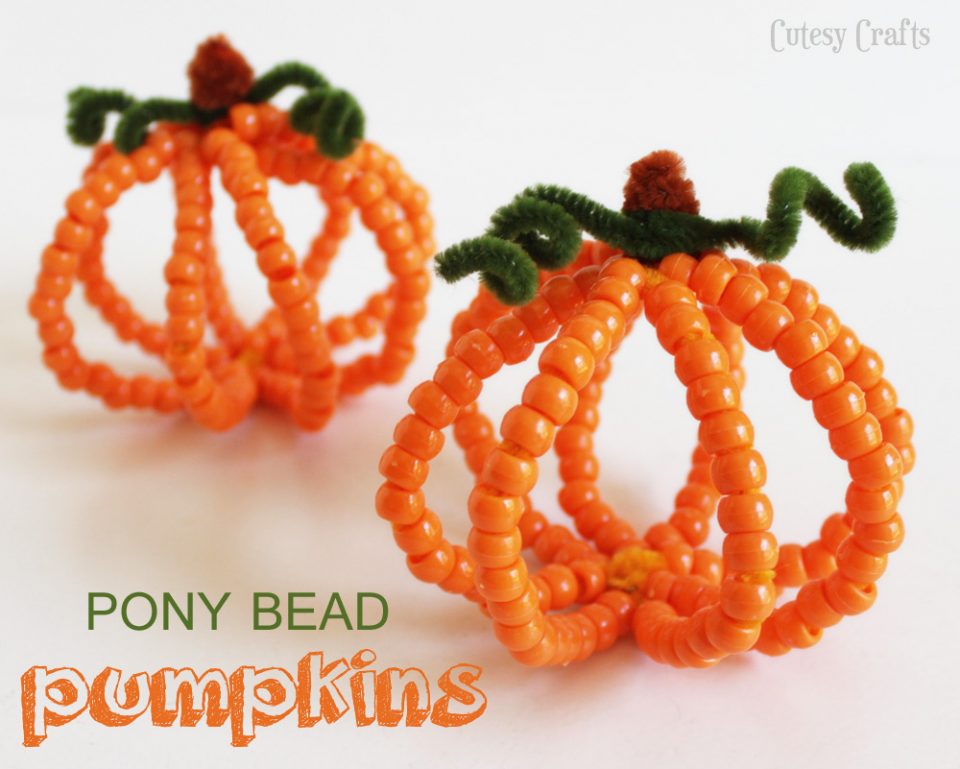 Craft pumpkins made of beads and pipe cleaner.